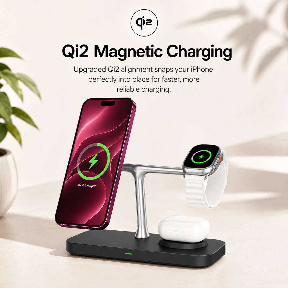 Midnight Black three device wireless charging station holding a phone magnetically #color_Midnight Black