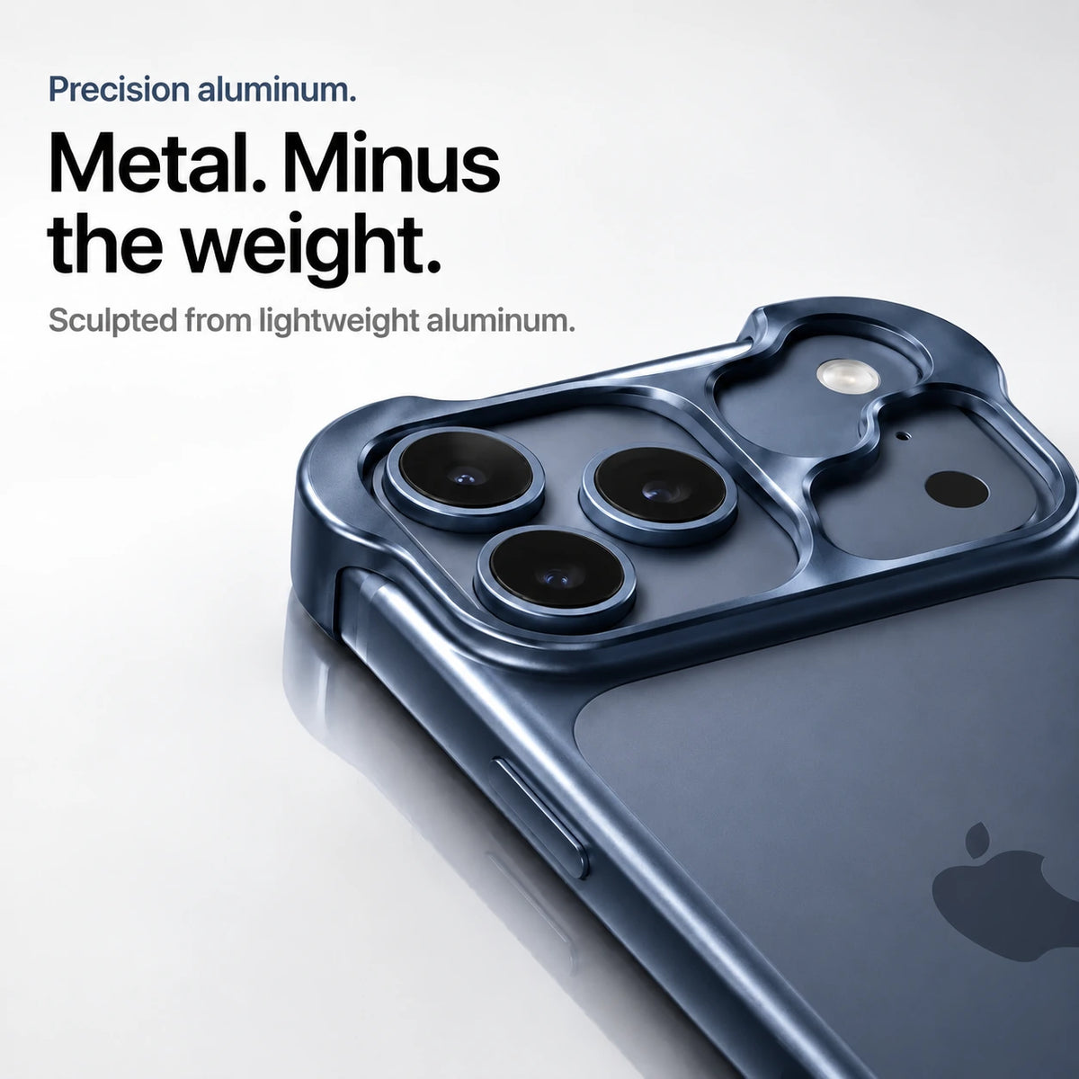 Navy blue sculpted metal phone case showing a close view of its sculpted camera guard #color_Deep Blue
